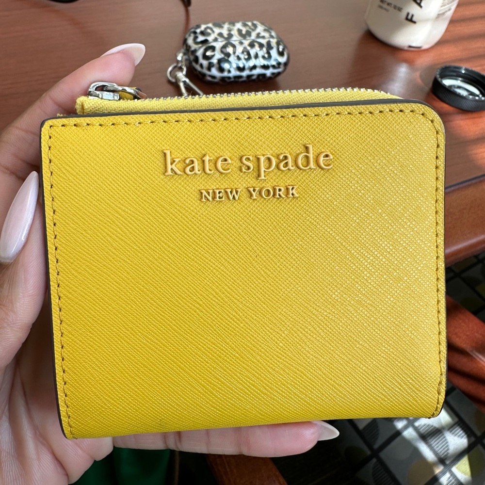 Bright yellow Kate Spade wallet